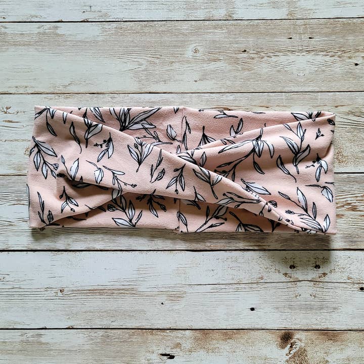 Pink Flora Wide Twist Headband for wholesale by Hot off the Hook