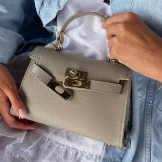 MELB Italian Elegant Beige Structured Leather Handbag and other Purchase Wholesale borse in pelle. Free Returns & Net 60 Terms on Faire trending on Faire.