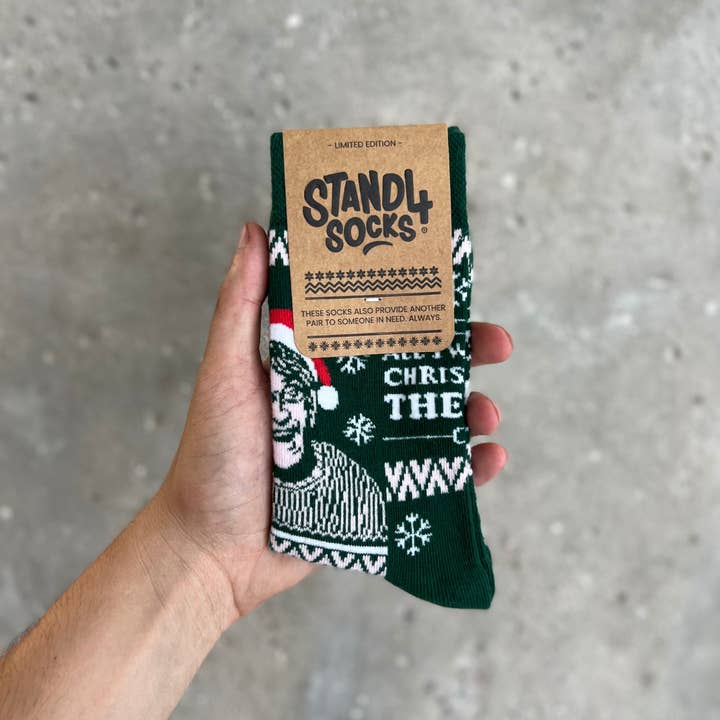 Green All I want for Christmas is Louis Theroux Sock for wholesale on Faire
