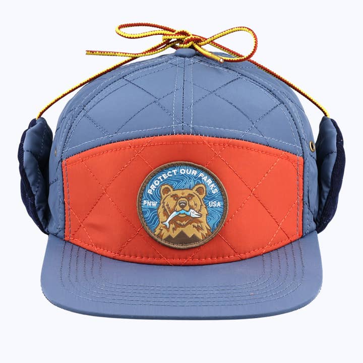 Protégez nos parcs Ours Casquette trappeur 7 panneaux - Bleu marine/Orange pour la vente par Rainier Watch Supply Co