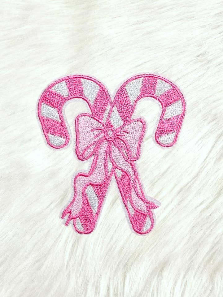 Pink Candy Cane Bow Embroidery Iron On Patch for wholesale by Scratch Decor