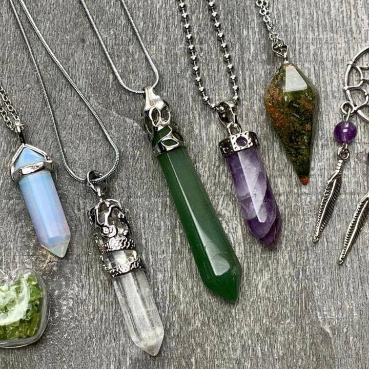 Assorted Gemstone Pendants with Stainless Steel Chain and other Purchase Wholesale crystal pendants. Free Returns & Net 60 Terms on Faire trending on Faire.
