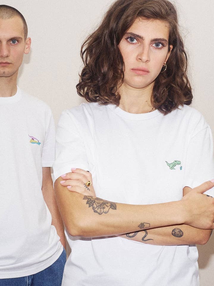 T-Shirt Dino Unisex TRINK-TIRY Bianco per la vendita all'ingrosso da parte di KREUZUEBER