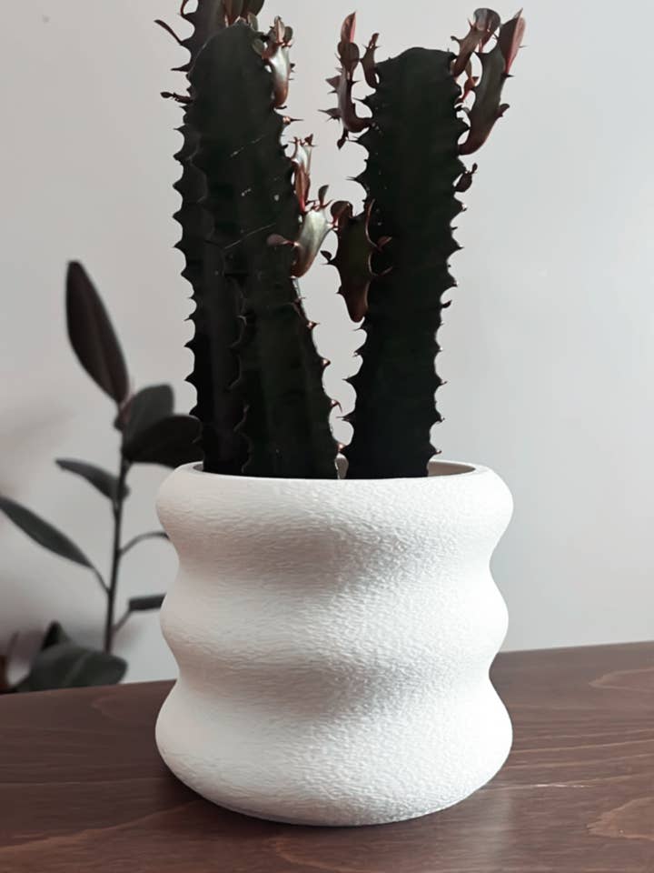 Fuzzy Wave Textured Plant Pot with drainage for wholesale by Prairie City Printing Co.