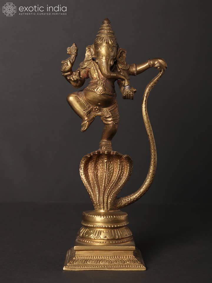 9" Lord Ganesha Idol Dancing on Five-Hooded Serpent for wholesale by Exotic India Art