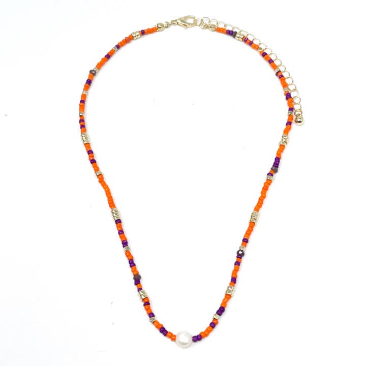 COACH ORANGE VIOLET pour la vente par Meghan Browne Style