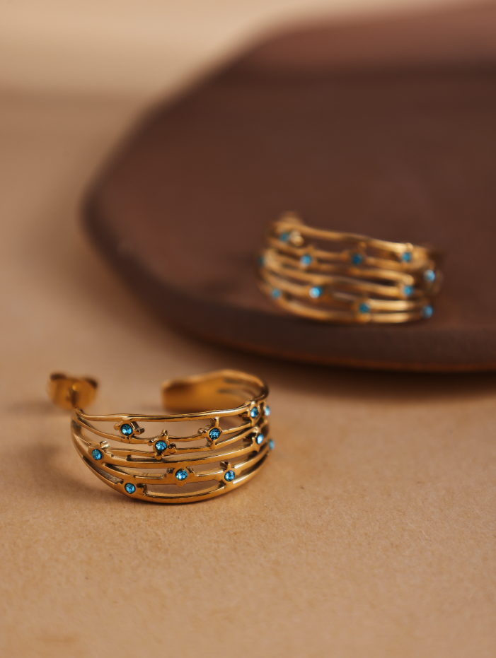 Revelari – wholesale Hoop earrings – Gold Hoop Earrings with Blue Crystal Accents1