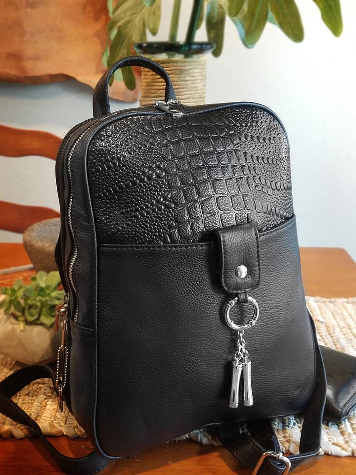 Cowhide leather back pack crossbody for wholesale by Roma Leathers, Inc.