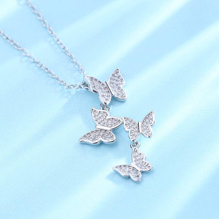 Amy and Annette - Wholesale Pendant/Charm Necklace - Swarovski Crystal Dangling Multi Butterfly Pendant Necklace