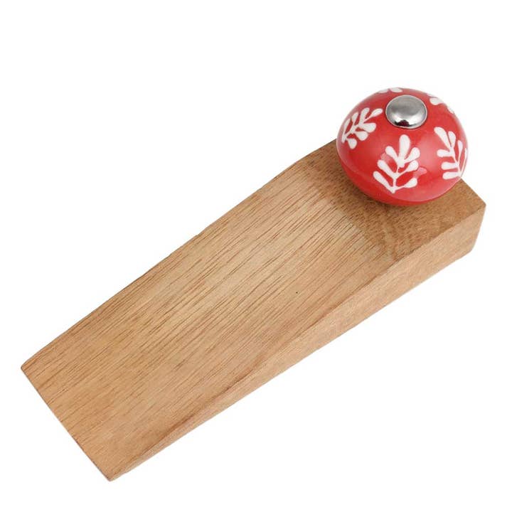 Red White 1 Piece Ceramic Wood Leaf Door Stopper Wedge (Red White) for wholesale on Faire
