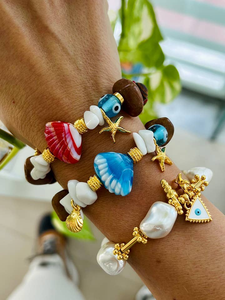 Bracciali in conchiglia, bracciale in perle con occhio per la vendita all'ingrosso da parte di Goupi