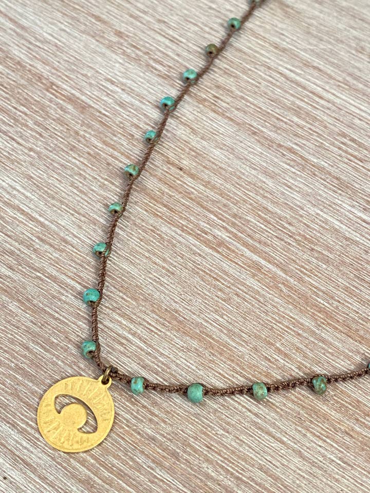 Evil Eye Protection Necklace On Crocheted Turquoise Stand for wholesale by Twist Style