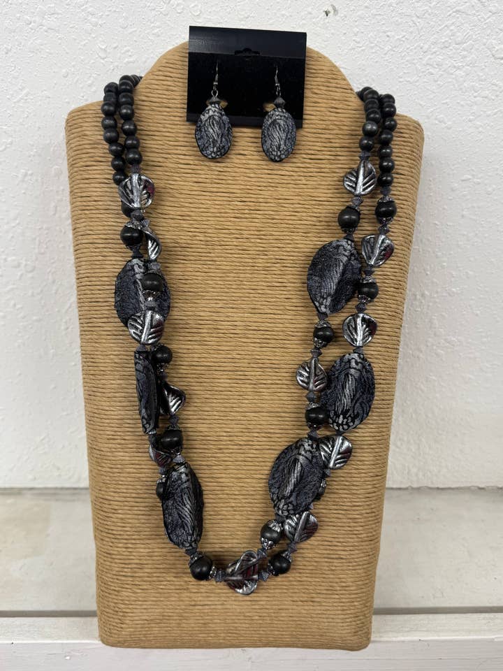 2 STRANDS BLACK MULTI ROW WITH SIX OVAL LEATHER ACCENTS NECK for wholesale by International Duru's