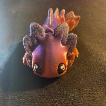3D printed and self-painted axolotl mini figure - inspired by my