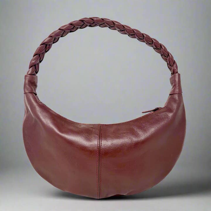 Burgundy Half Moon Leather Shoulder Bag – Handmade with Braided Handle for wholesale by Artisan Stories