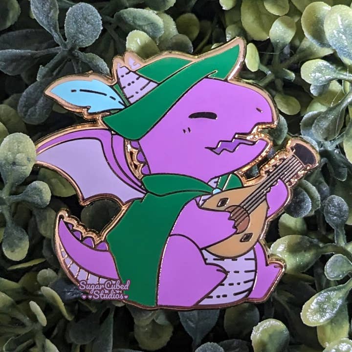 Sugar Cubed Studios - Vente Épinglettes/boutons - Épinglette en émail Le Barde Draconique, Dragons et Dragons0