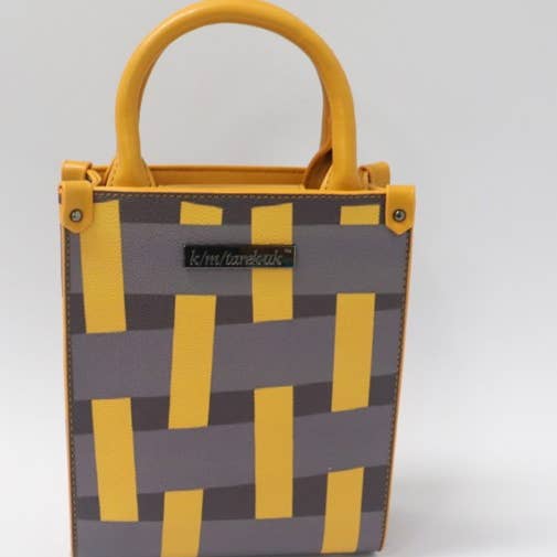 Tarek-Designer-Bags for wholesale by K. M. TAREK DESIGNER BRANDS INT'L GROUP (UK) LTD