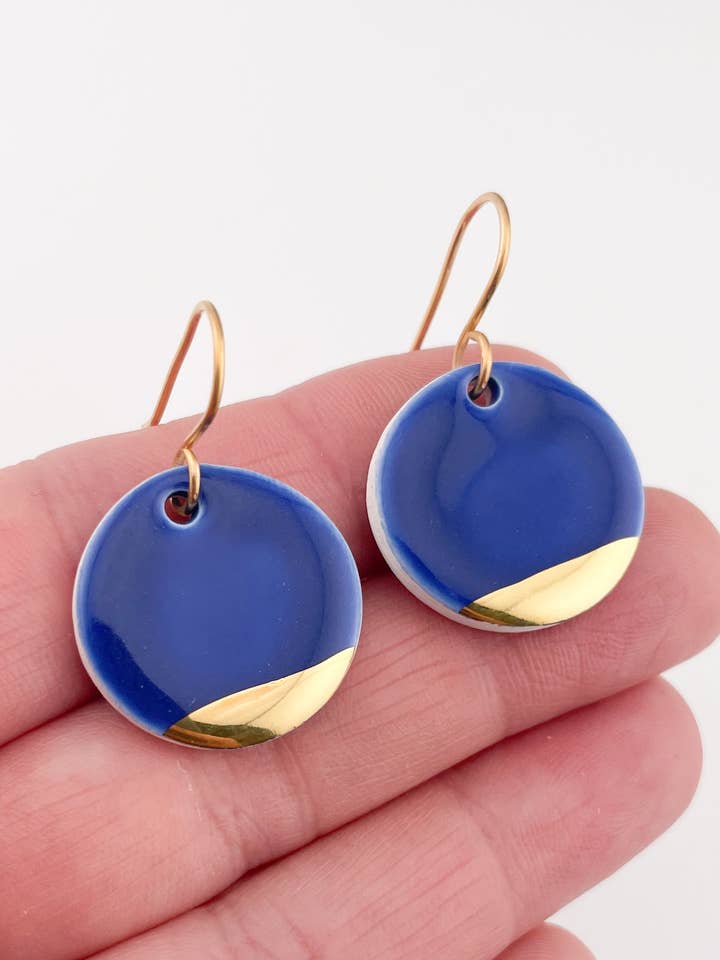 Navy blue round dangles for wholesale by Clay Blanca