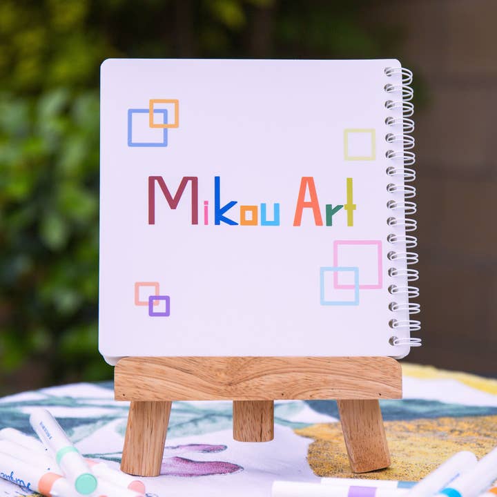 MikouArt – Engroshandel Klistermærke - Børn og baby – Sød genanvendelig klistermærkebog | Kat på pladsen | 6x6 | Dobbeltsidet | 40 sider | Mikou Original Art81