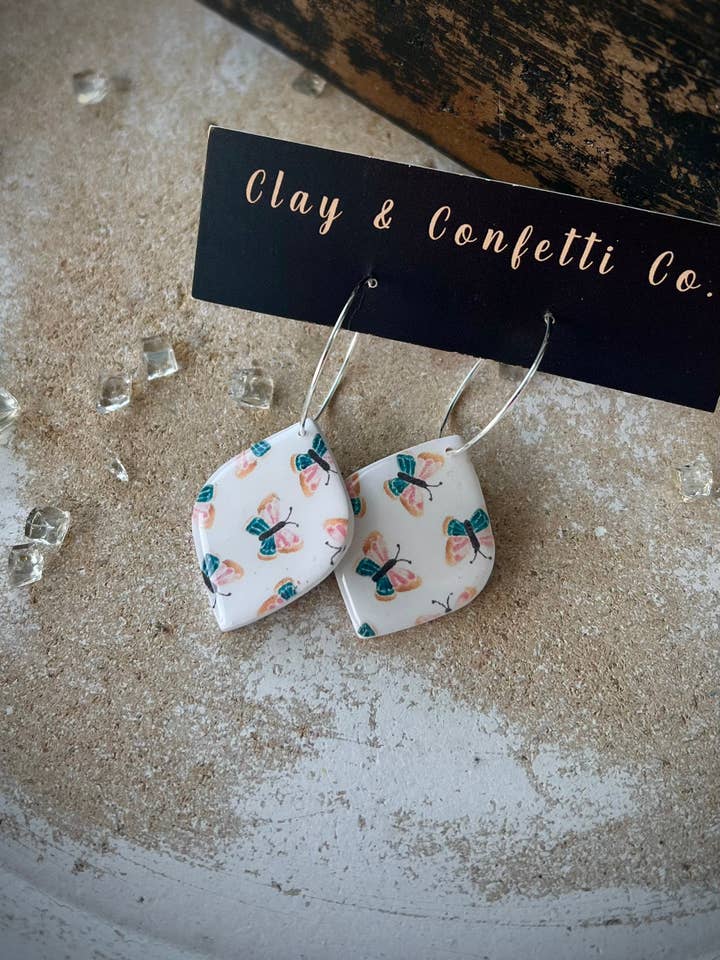 Real and pink tear on a hoop for wholesale by Clay & Confetti Co.