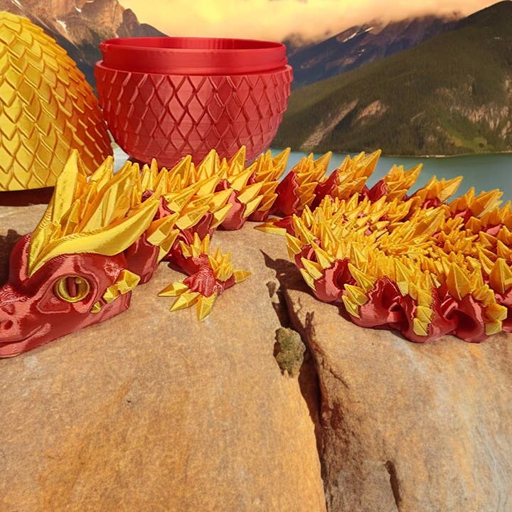 Red & Gold Fidget Dragon with egg for wholesale by Crafted Mayhem