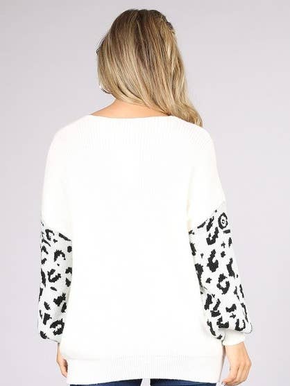 OUT81253a Tvåfärgad ribbad gepard print v-ringad stickad topp för wholesale av Oceanus Apparel