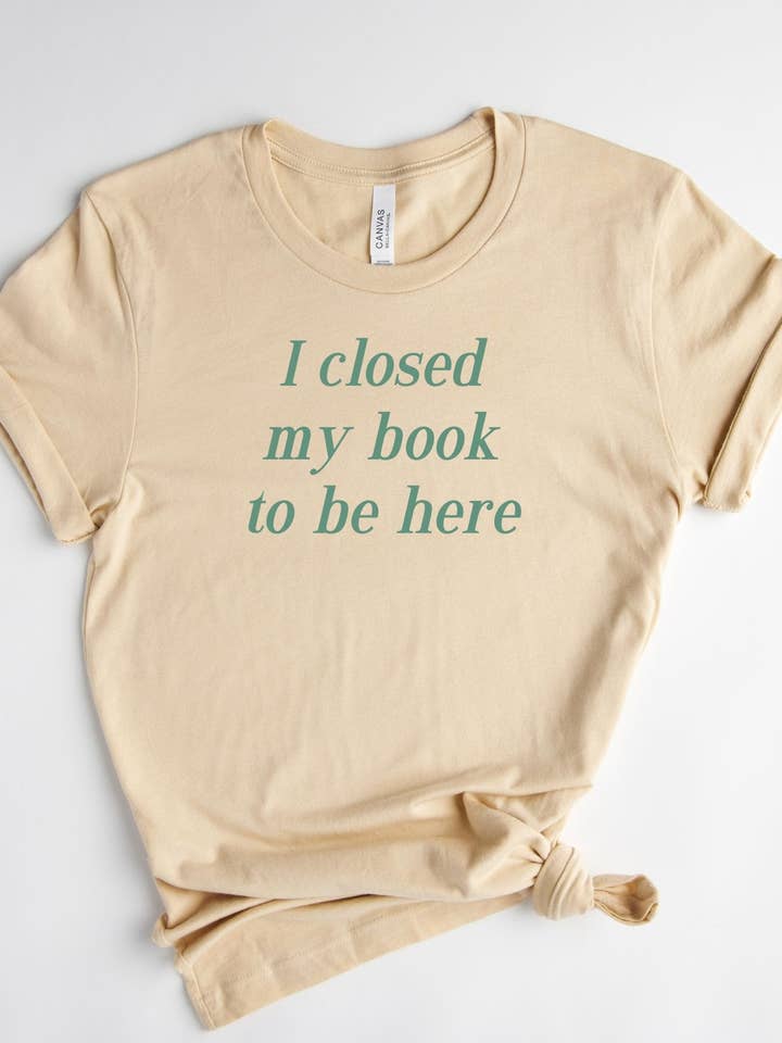 I Closed My Book To Be Here Tee for wholesale by Inkwell Threads