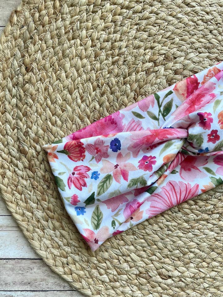 Bright Pink Blooms Knit Twist Headband for wholesale by Designs by Rachel Joy