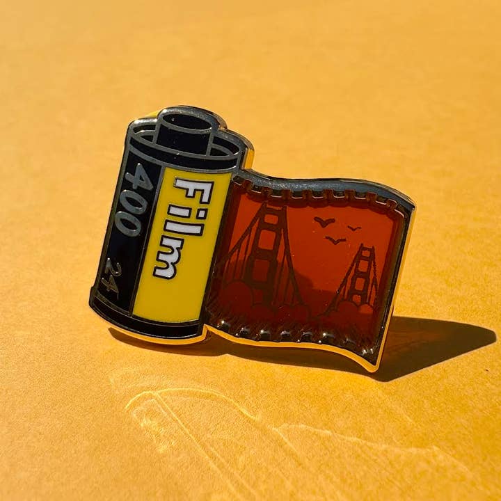 Painting With James - Venta al por mayor Botón/prendedor - Insignia de esmalte iluminadora de rollo de película de San Francisco
