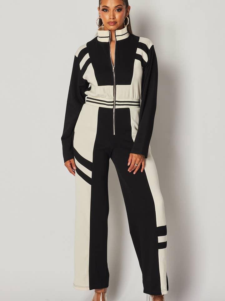 Black Just Fine Stripe Color Block Track Jumpsuit (HDR32861) for wholesale on Faire