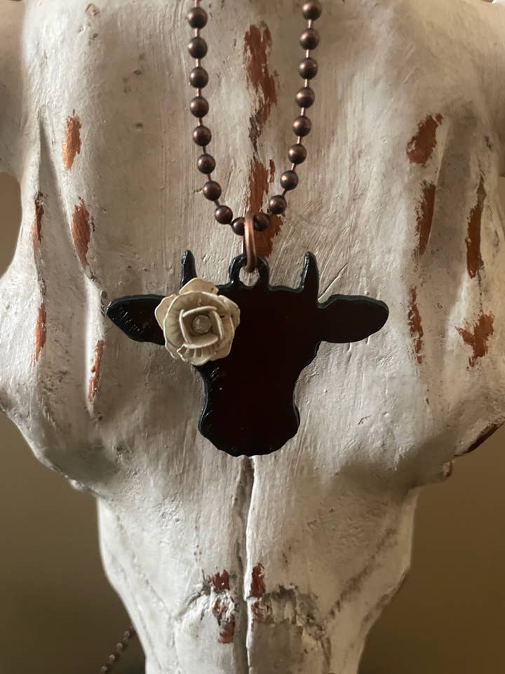 Rustic COW Face shape necklace with painted white flower for wholesale by The Rustic Barn