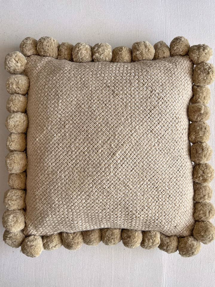Square Pom Pom Cushion – Beige (Hand-Dyed Sheep Wool) for wholesale by CHACO Goods