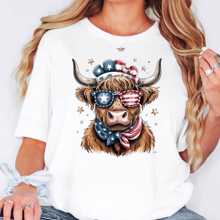 Patriotic Highland Cow 4th of July Graphic Tee for wholesale by Happy Mail Wholesale
