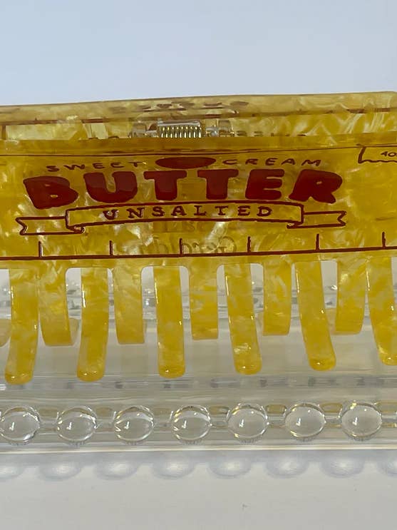 OSALTAT SMÖR HÅRKLÄMMA för wholesale av Saint Geraldine