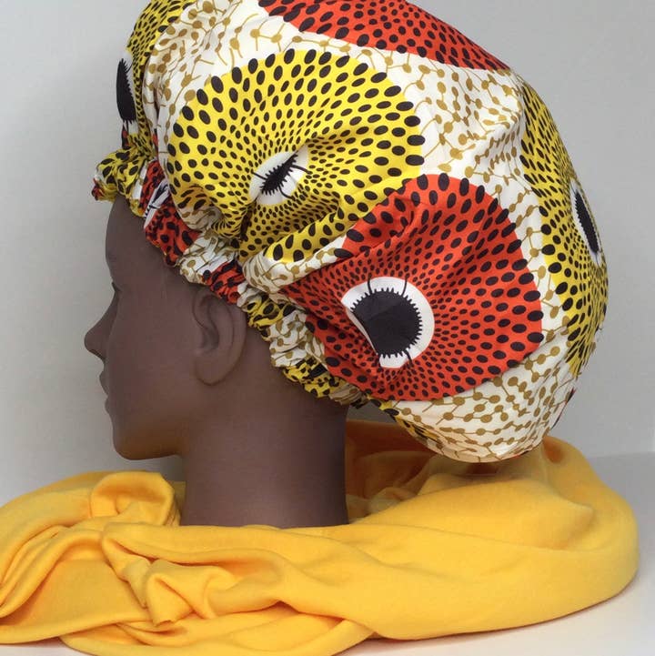 Gorros de pelo con estampado africano para retener la longitud de la humedad Pro para venta al por mayor de NIA'S BEAUTY BAR L.L.C.