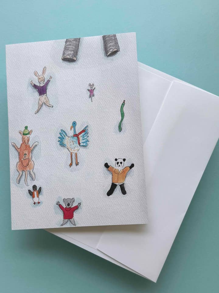 Snow Angel Animals – Whimsical Winter Holiday card for wholesale by Alexandra Schmeling Fine Art