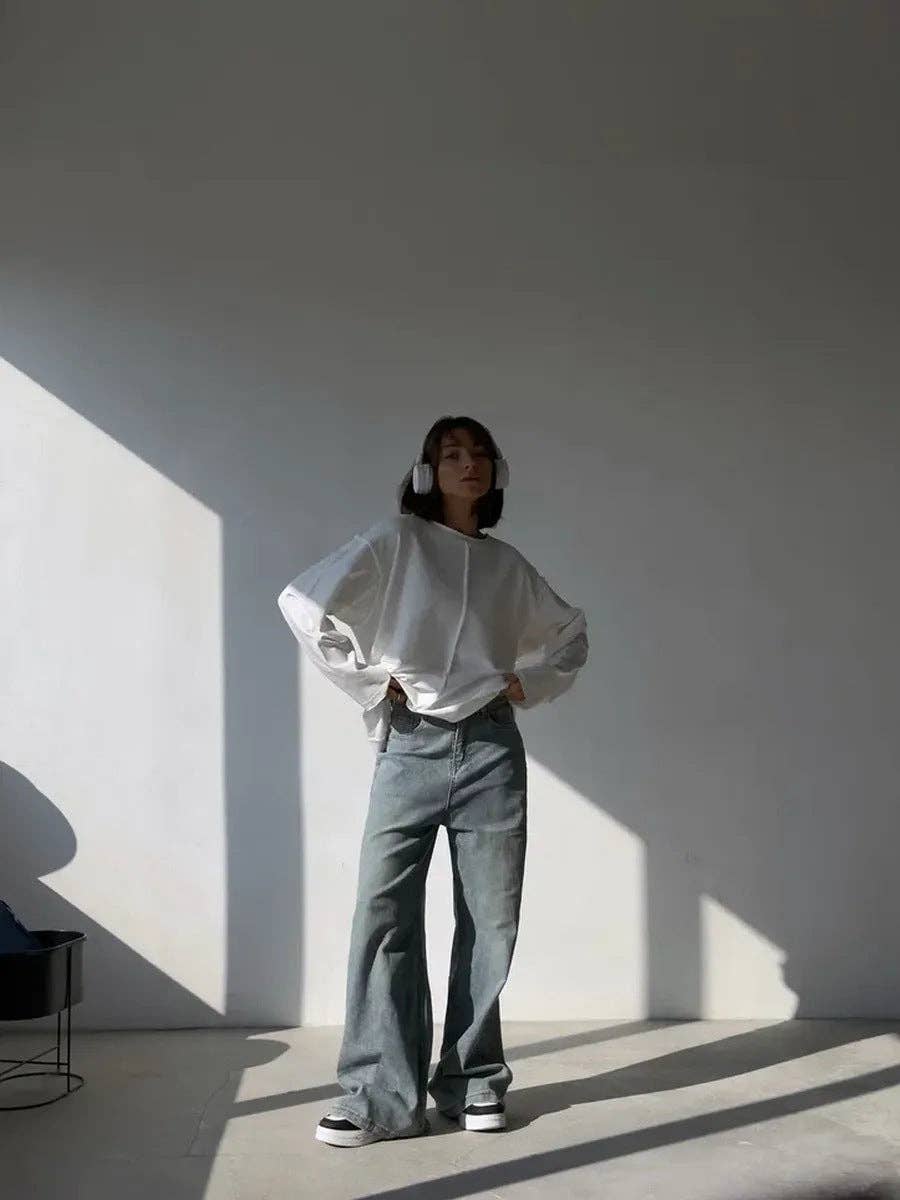 Suhkasana – wholesale T-shirt (utan tryck) – Dam – Avslappnad löst sittande bomullströja med långa ärmar och slitna detaljer.1