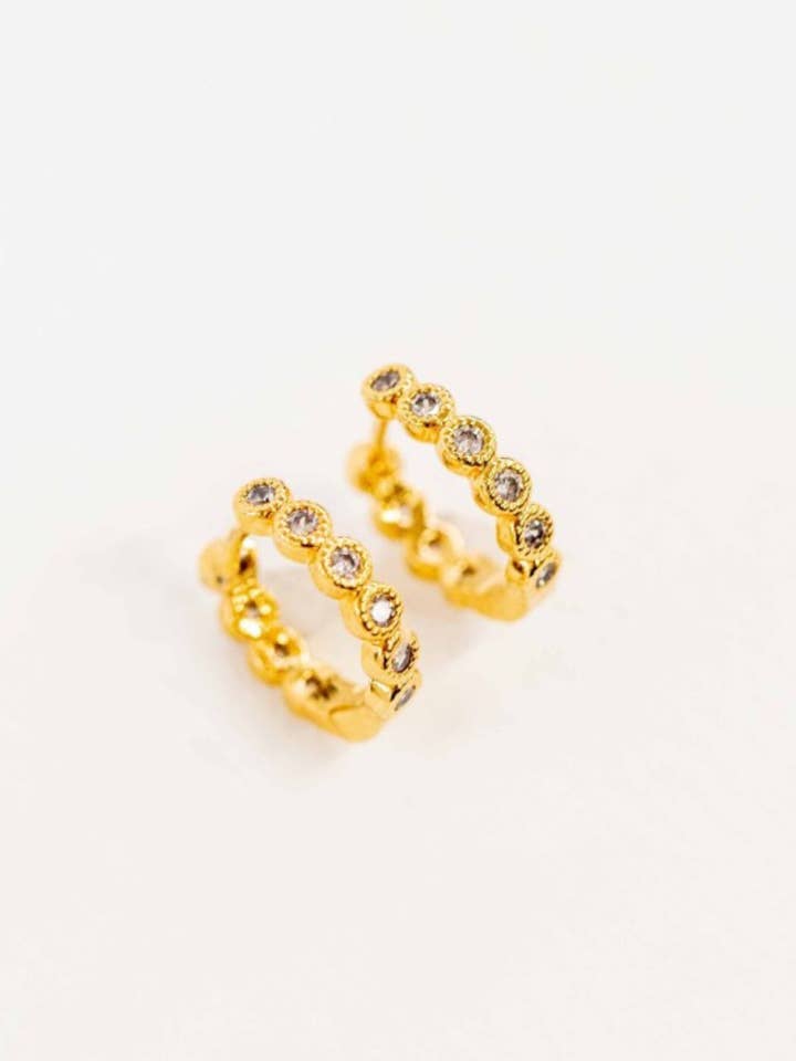 Surreal Huggie Hoop Earrings | Gold for wholesale by REBDOLLS