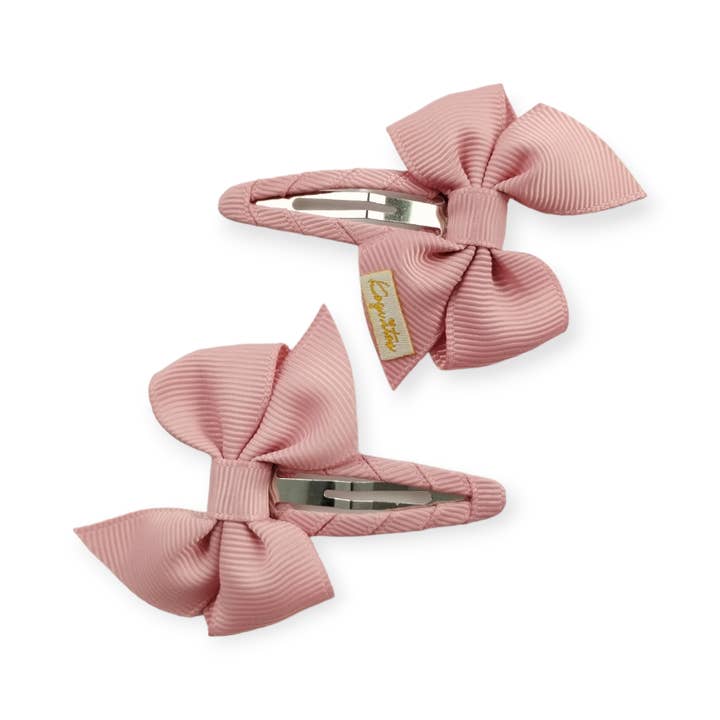 Paket med 2 rosettklämmor för wholesale av Koquitos