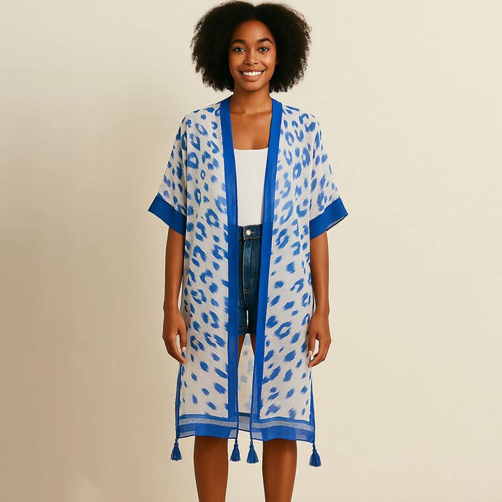 Kimono-Poncho mit Leopardenmuster, Quasten-Details und offenem Vorderteil für den Großhandel von Sensibling Corp.