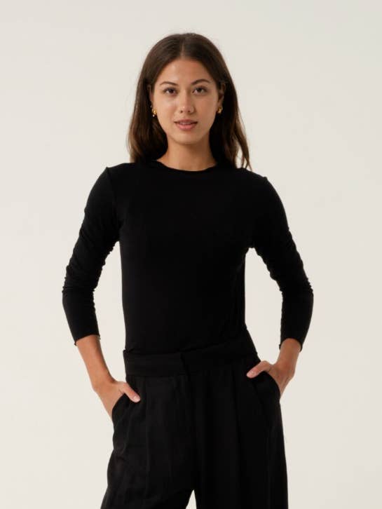 Suri Svart Långärmad Topp för wholesale av AMIRA Collective