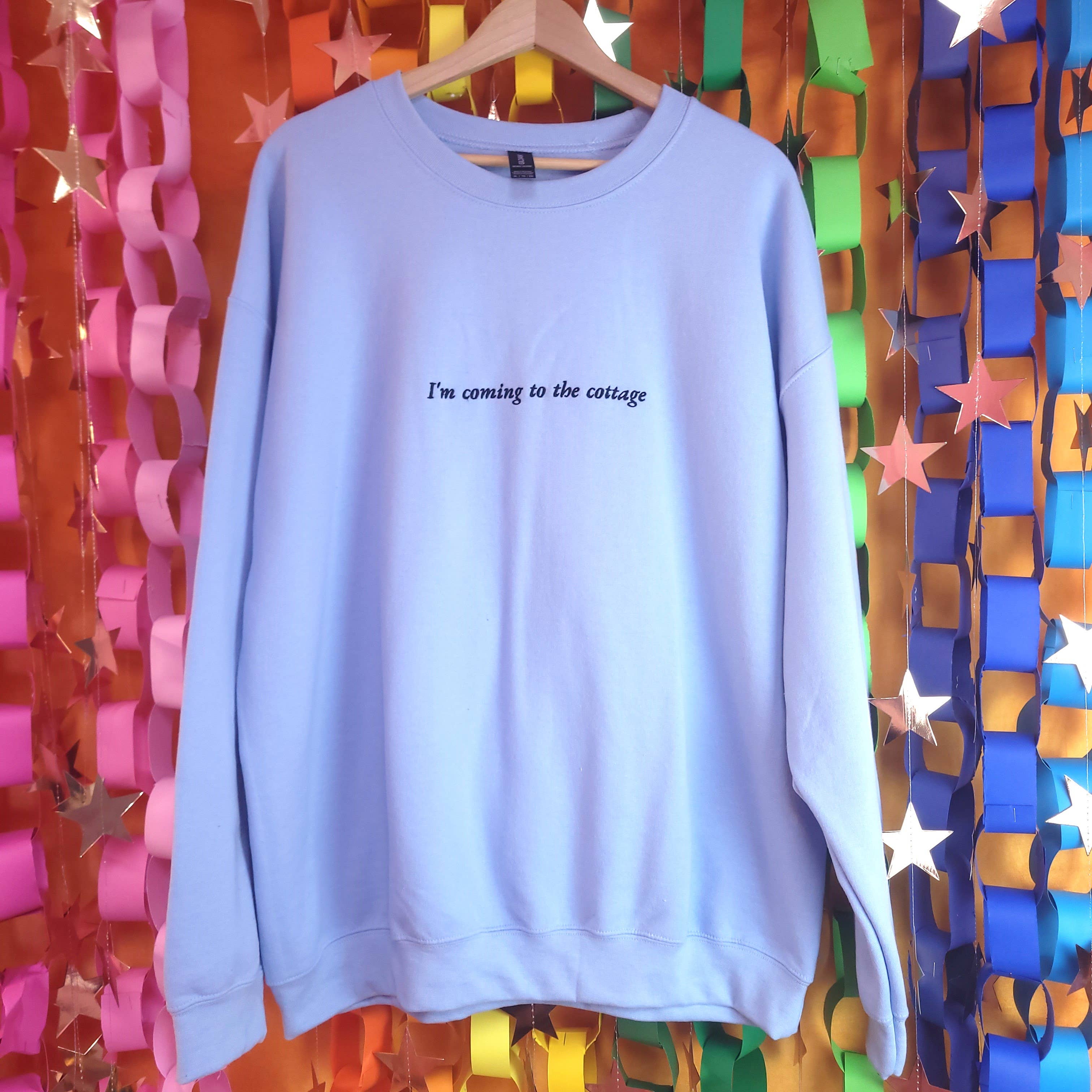 Sunshine Studio - Wholesale T-Shirt - Women's - "I'm coming to the cottage" Heated Rivalry Crewneck0