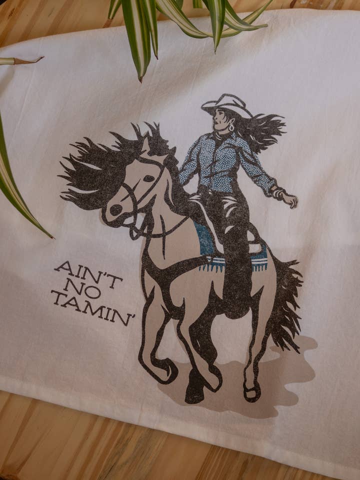 Ain't No Tamin' Western Tea Towel for wholesale by Shop Good
