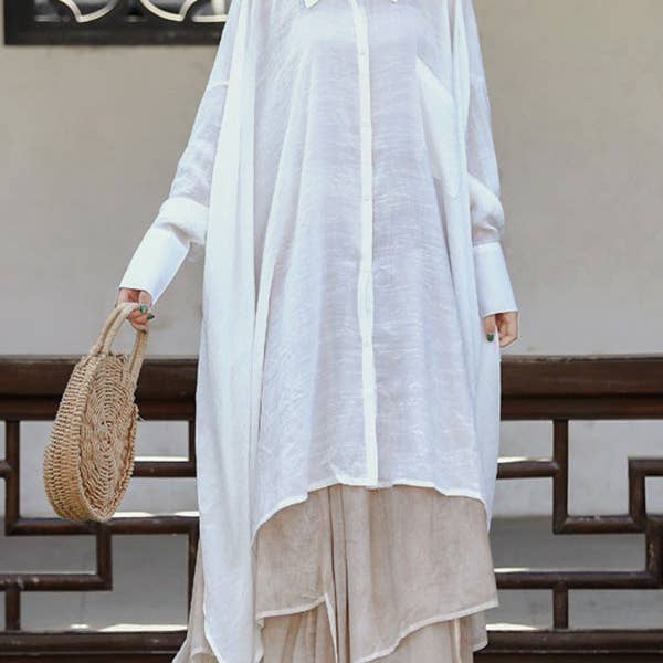 Blusas holgadas con mangas raglán transparentes en color liso con solapa dividida y juntas divididas para venta al por mayor de Plush Looks