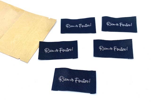 L’Étiquette Home Couture - Wholesale Craft Supplies - Sew-On Woven Label "Don't Give a Damn" black1