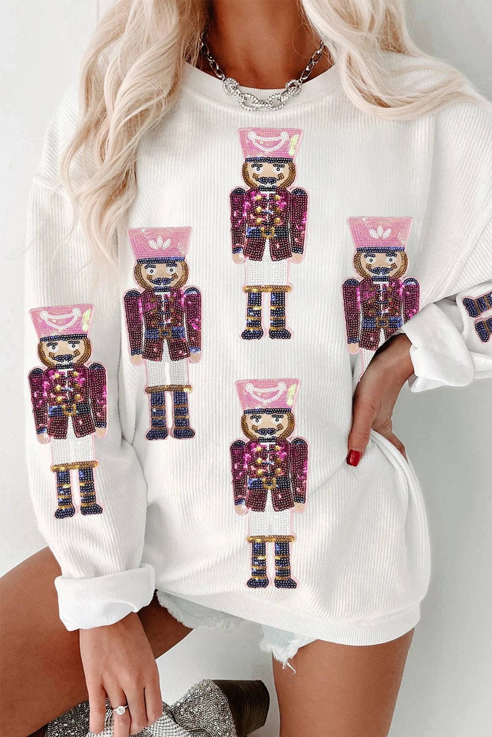 Branco Sweatshirt de Natal com Lantejoulas Brancas e Gráfico de Moda com Cordão para venda a revendedores na Faire1