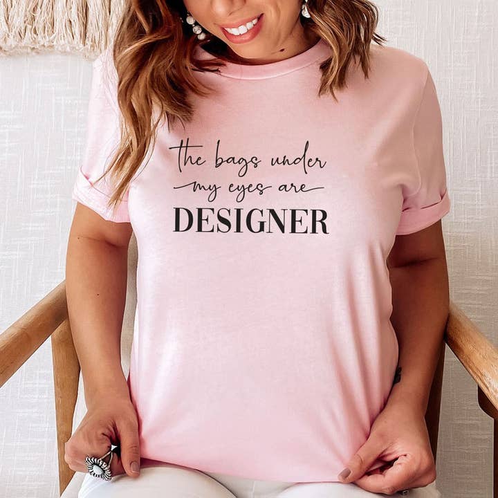 Designer Bags Graphic Tee and other Purchase Wholesale designer inspired tshirts. Free Returns & Net 60 Terms on Faire trending on Faire.