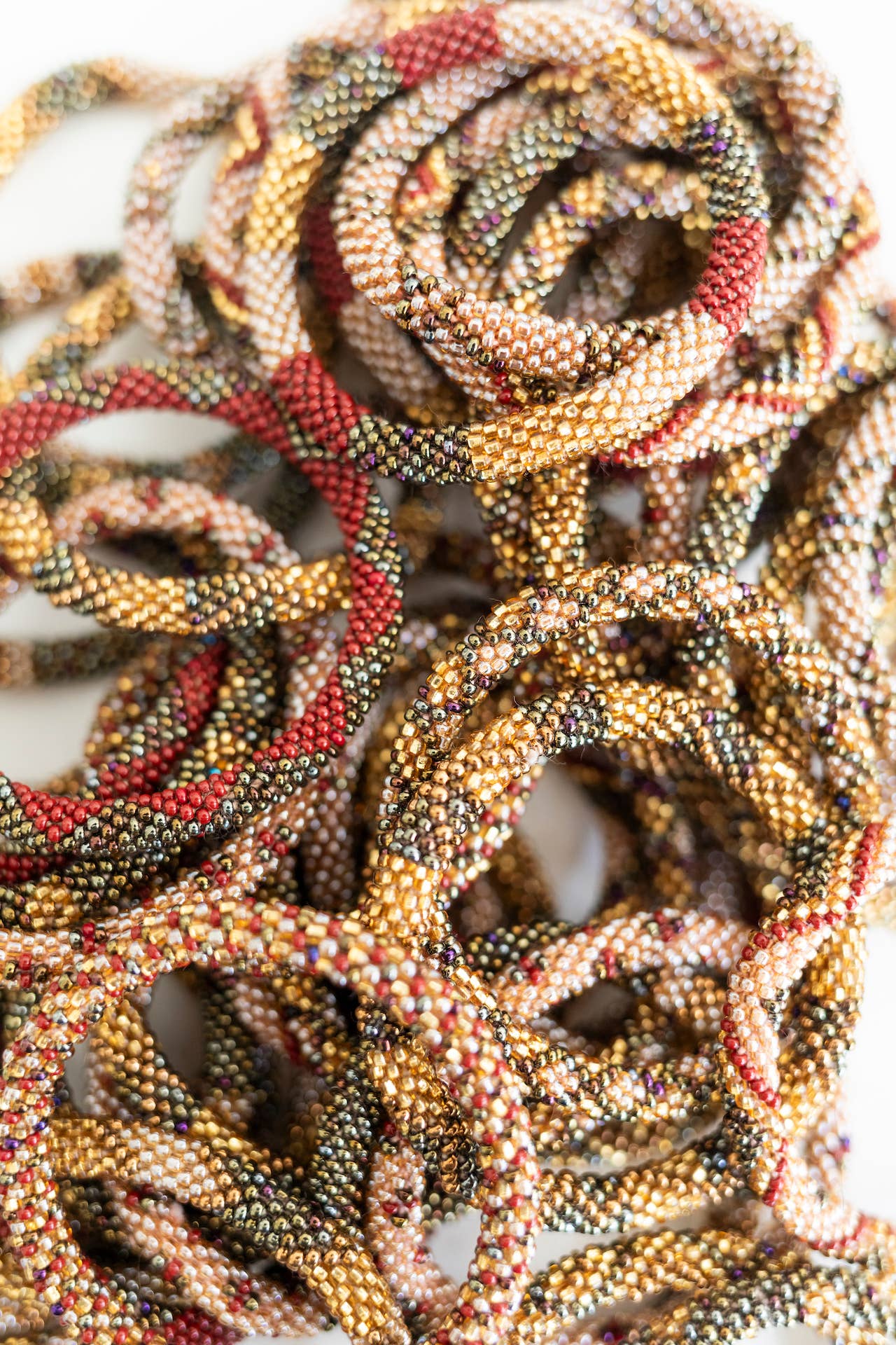 Aid Through Trade - Wholesale Beaded Bracelet - Roll-On® Bracelets - Chestnut Set of 122