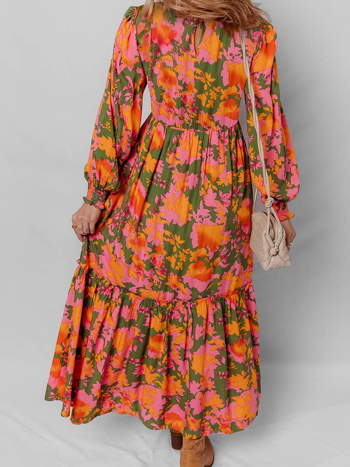 Orange Orange blommig klänning med puffärmar, smockad liv och volanger. för wholesale på Faire1