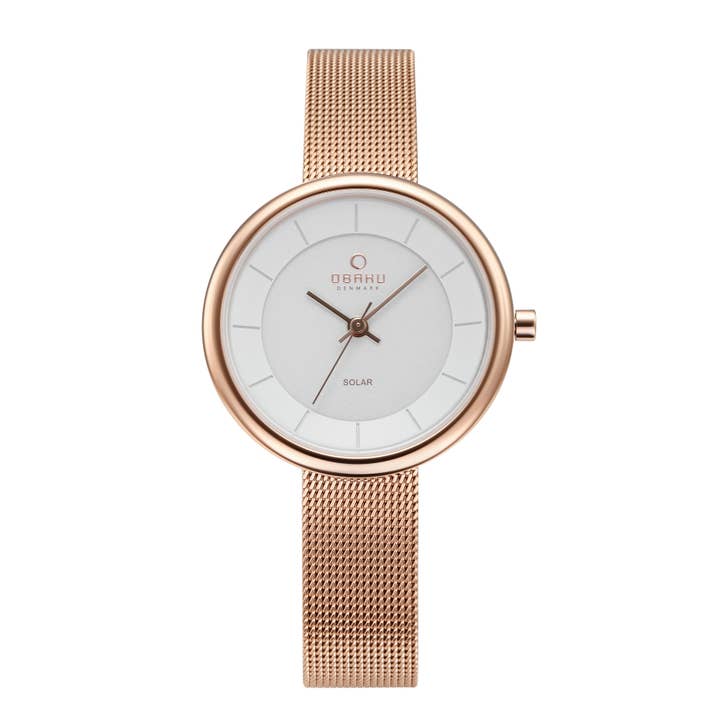 Damklocka i liten storlek med roséguld IP, solcellsdriven rörelse och mesharmband. för wholesale av Obaku Denmark Watches